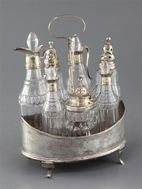 A George III silver oval boat shaped cruet stand, 24cm.